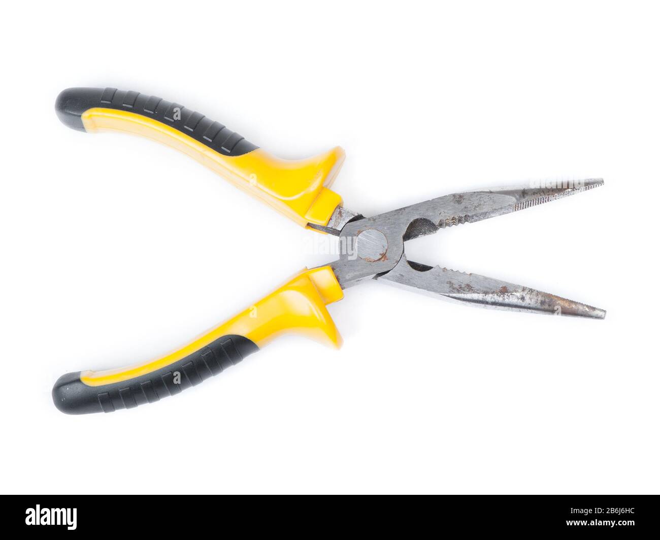 Old pliers with yellow handle isolated on white background Stock Photo