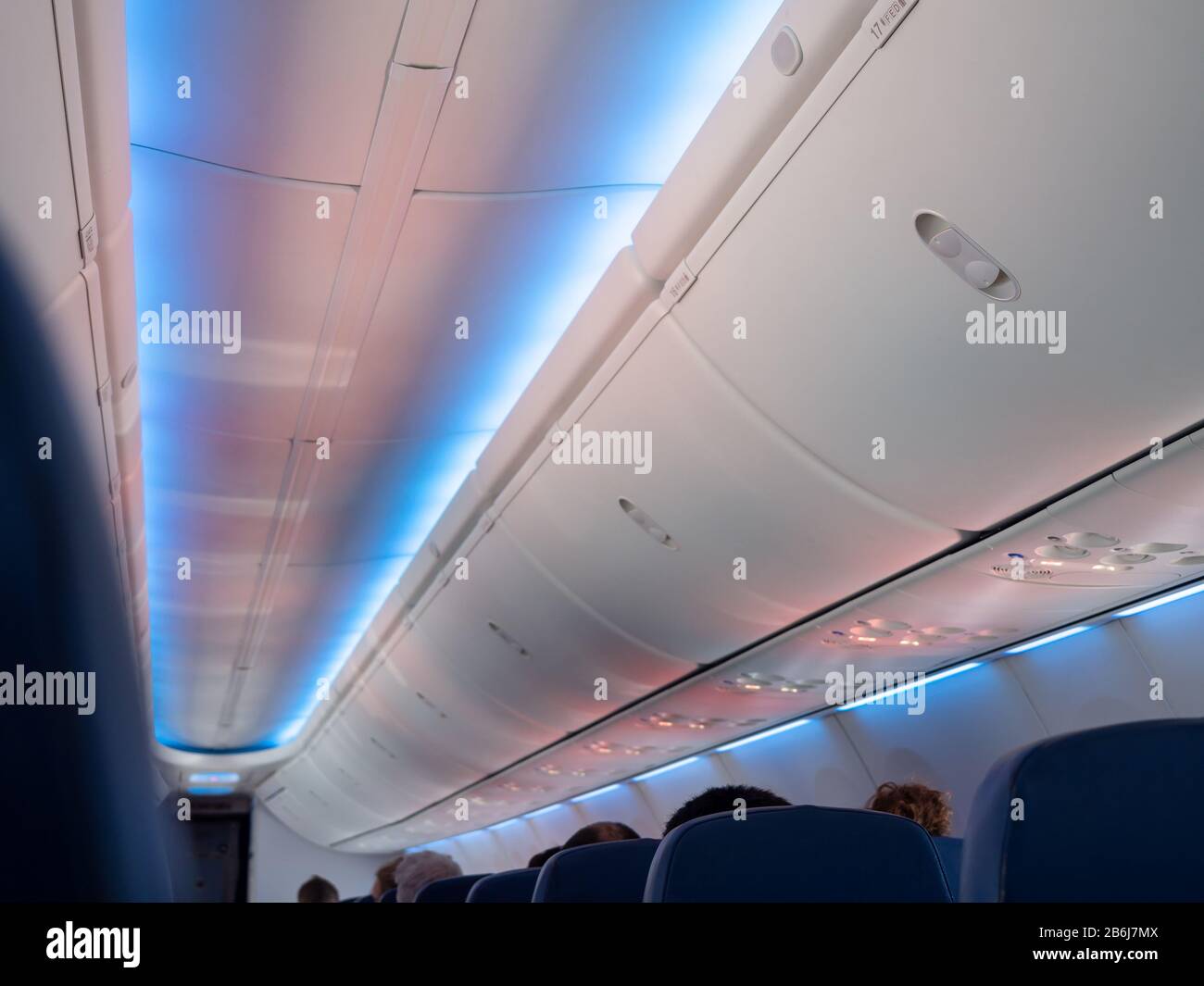 Hand luggage compartment in cabin economy class on the low cost