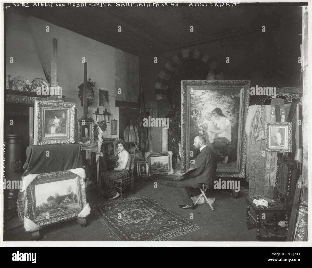 The painter Hobbe Smith in his studio, Sarphatipark 42, Amsterdam, with a model RP-F-00-2609 The painter Hobbe Smith in his studio, Sarphatipark 42, Amsterdam, with a model object type: photo late edition Item number: RP-F 00-2609 Manufacturer : Photographer: Sigmund Löwfotograaf: Atelier Herz Dating: Apr 28 1903 Physical features: gelatin silver printing technique: gelatin silver print procurement and Stock Photo