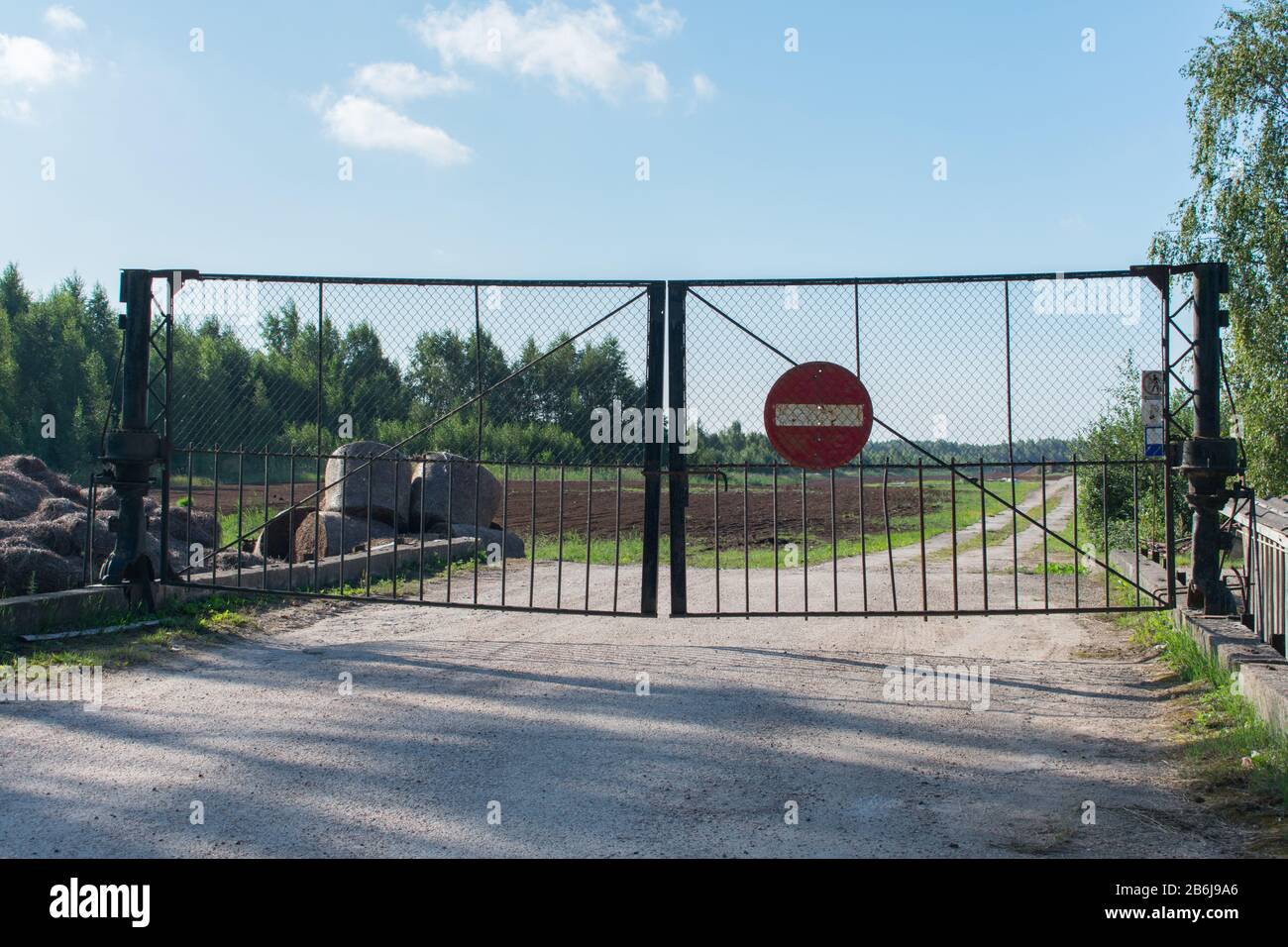 Old no entry for vehicular traffic road sign on rusty fence. Forbidden ...