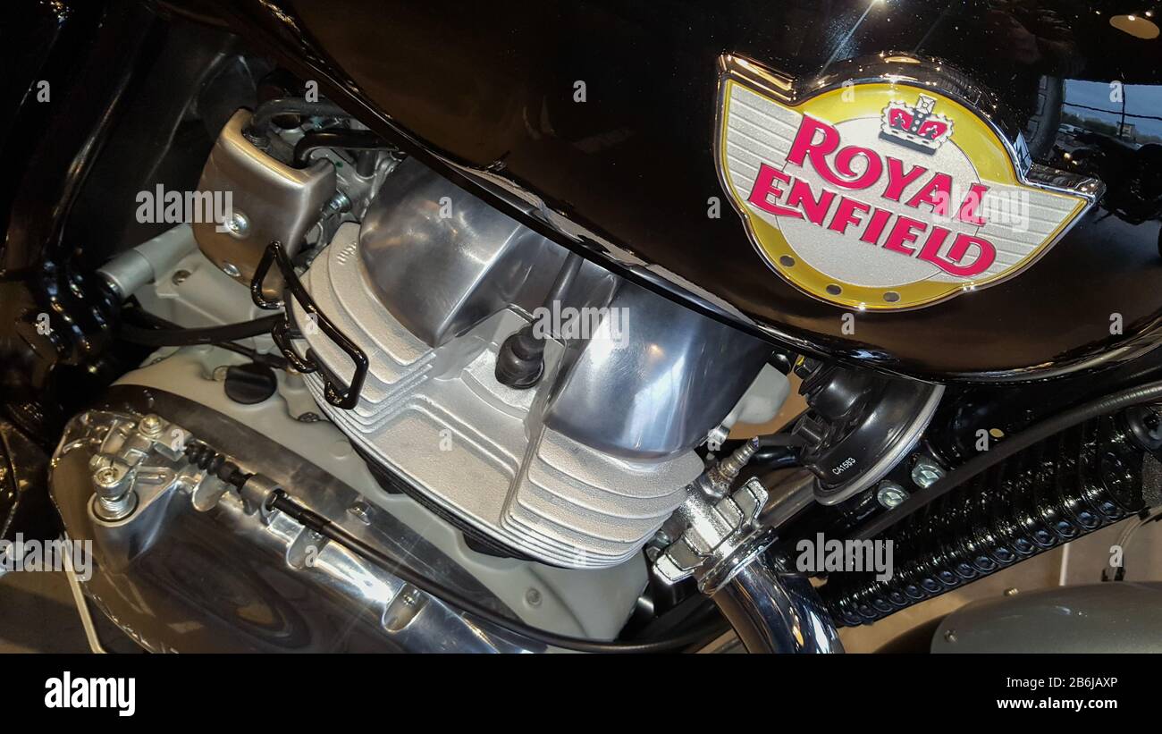 Bordeaux , Aquitaine / France - 12 19 2019 : Royal Enfield logo on the Fuel tank of motorbike motorcycle Indian manufactured Stock Photo