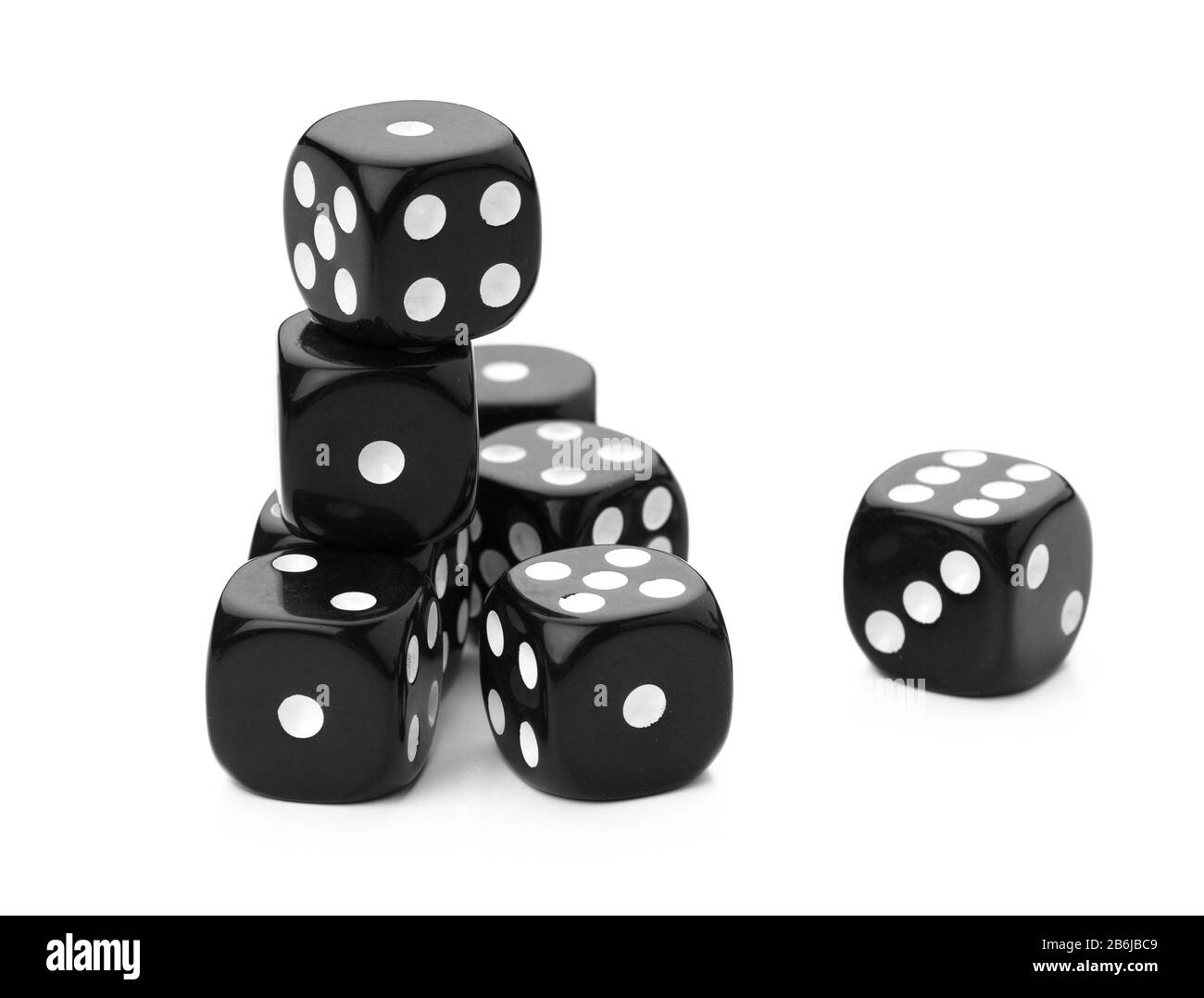 black dice on a white background creative photo Stock Photo - Alamy