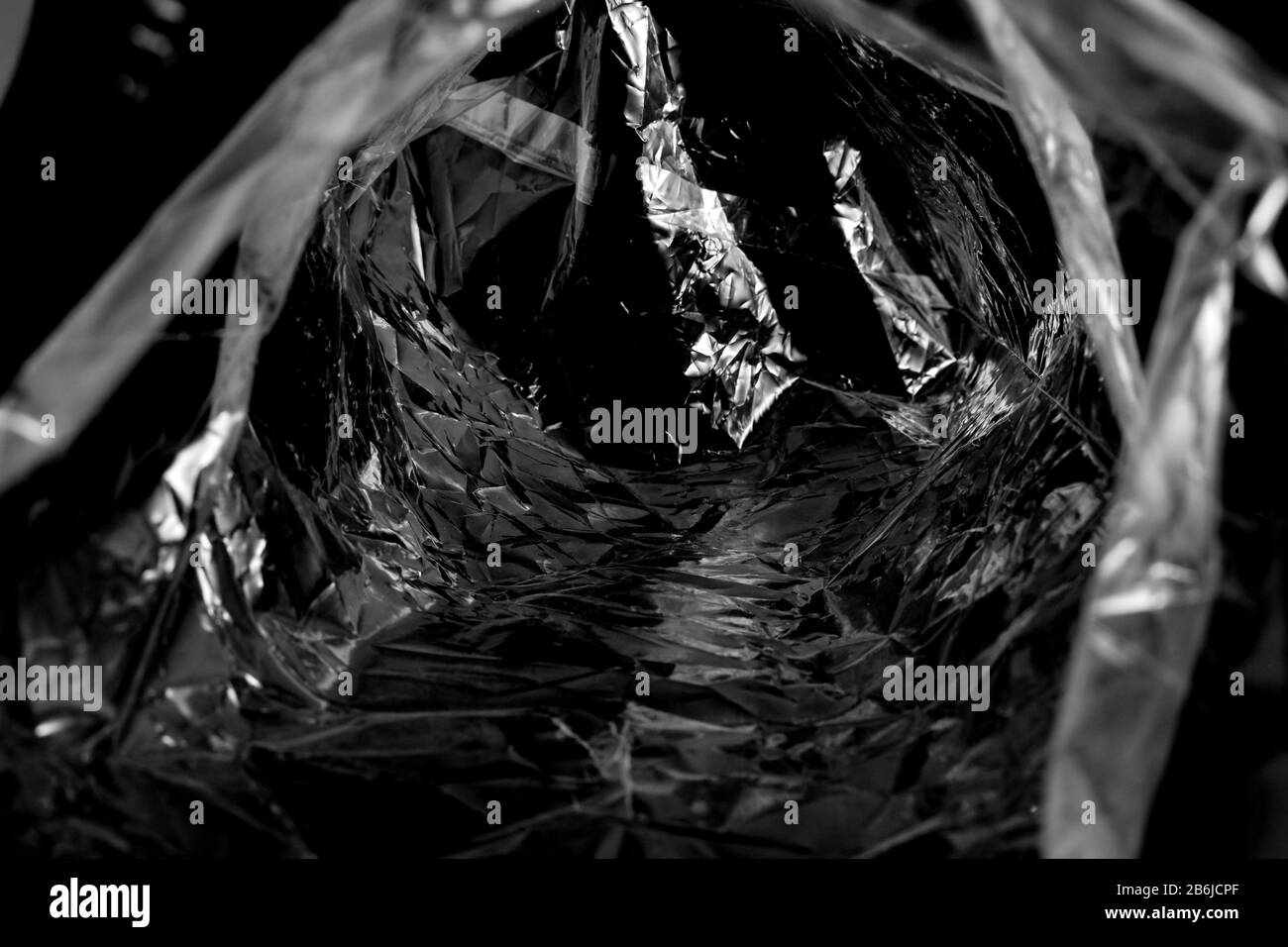 Inside the white plastic bag on a black background Stock Photo Alamy