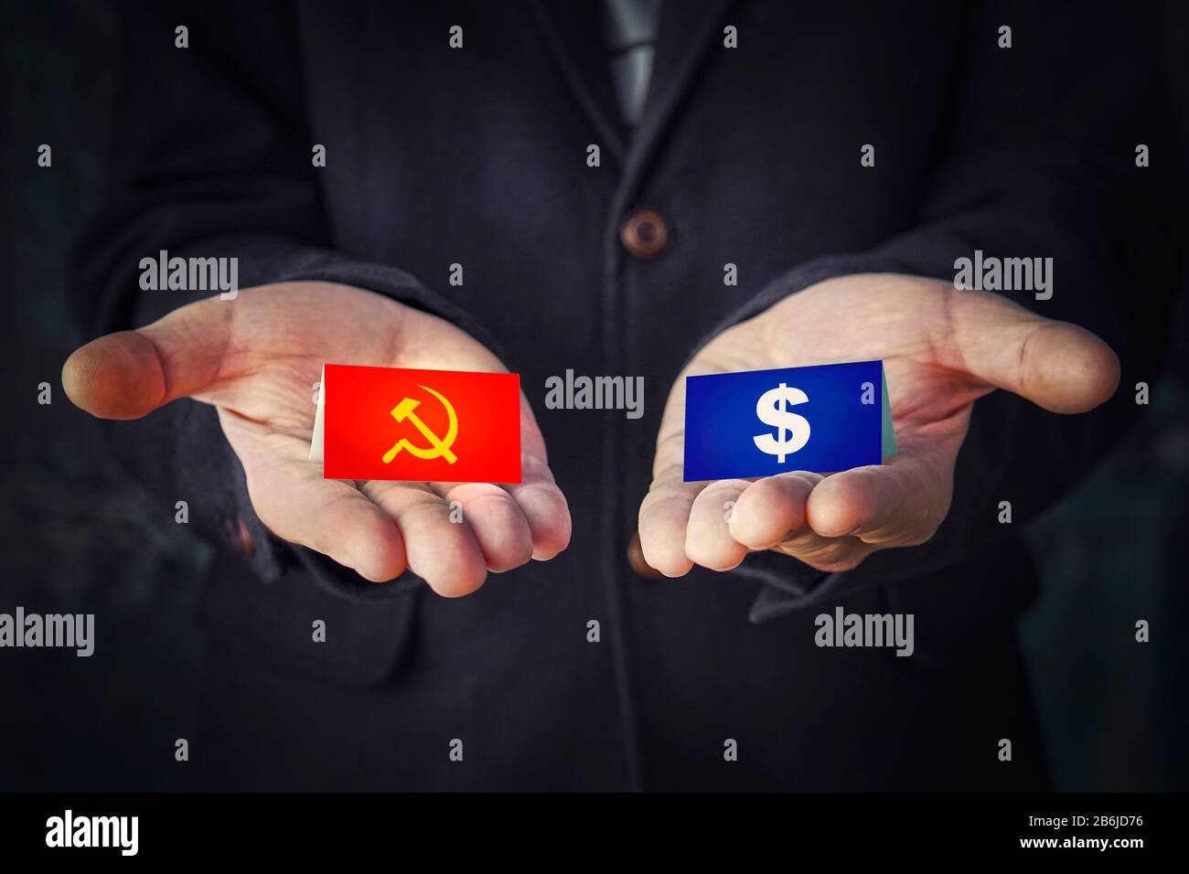 choice of political system is communism or capitalism. sign hammer and  sickle or a dollar in the hands. concept of political party elections or  misled Stock Photo - Alamy, image size:1300x956