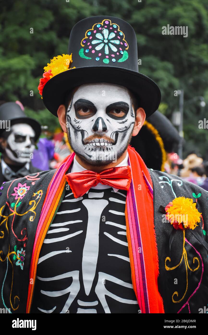 Mexico City, Mexico, ; October 26 2019: Portrait of a man in disguise at the Day of the Dead parade in Mexico City Stock Photo