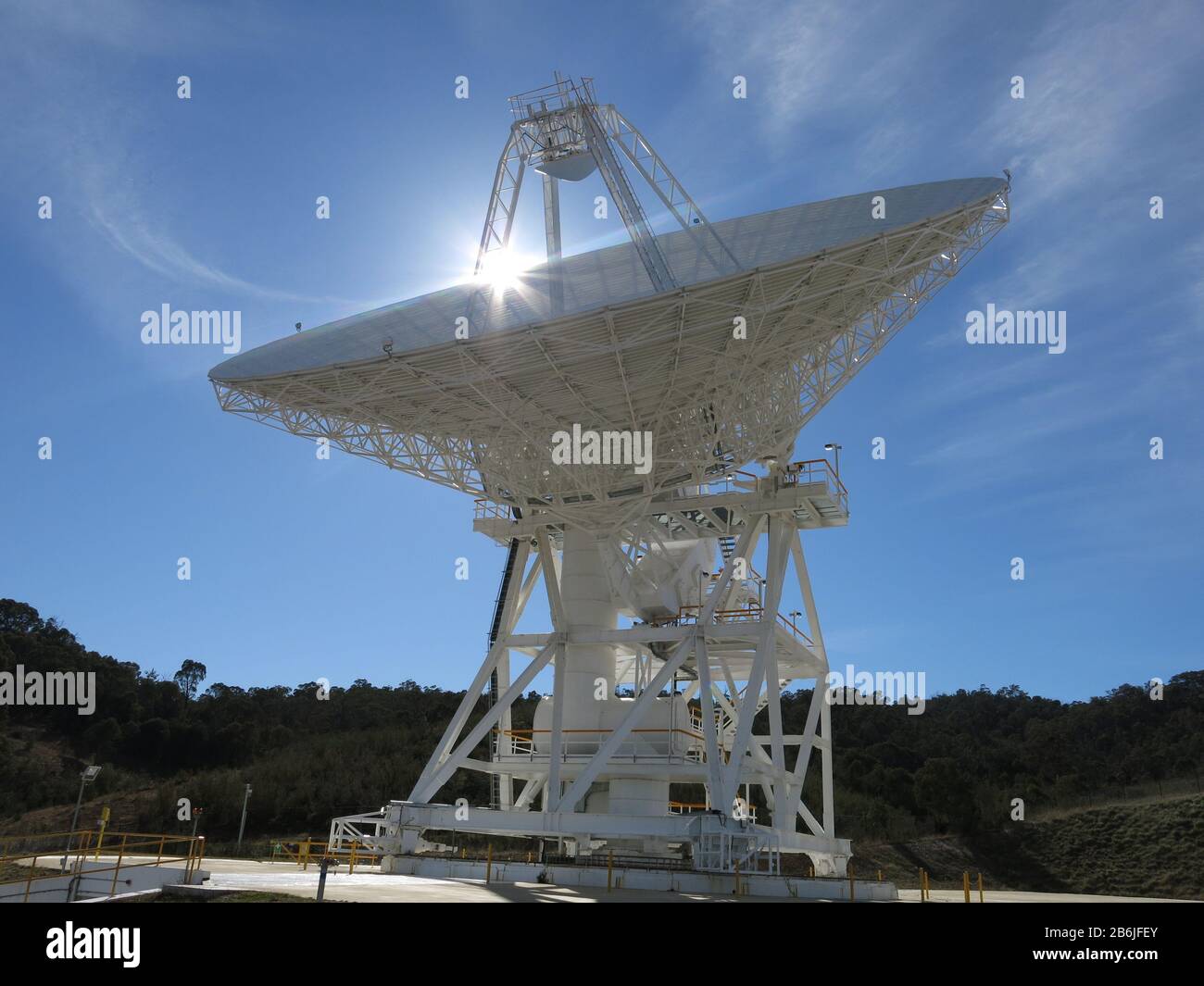 Deep Space Station Antenna and sun, Canberra Australia Stock Photo