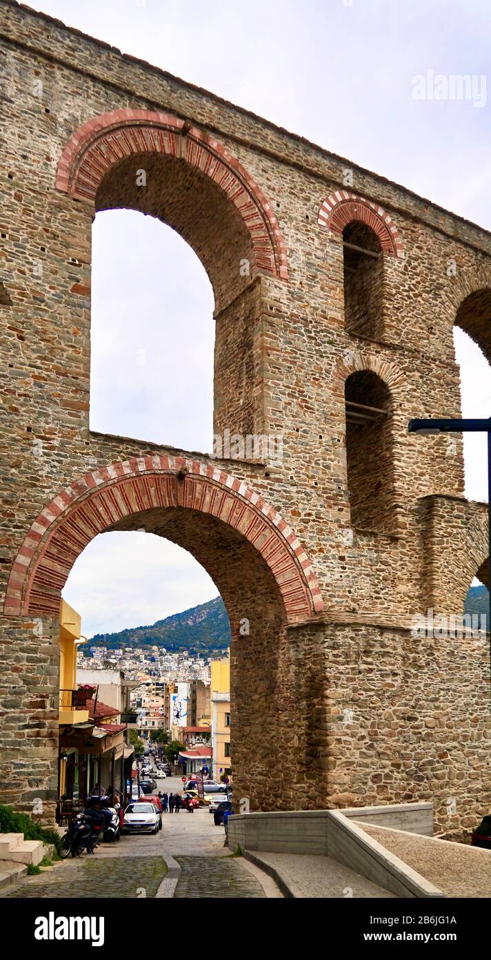 Kavala, Eastern Macedonia, Aegean Sea, Greece, the Roman aqueduct (Kamares) and the city of Kavala, it consists of 60 arches of four different sizes and a maximum height of 52m. and it was reconstructed in 1550 by Suleiman the Magnificent Stock Photo