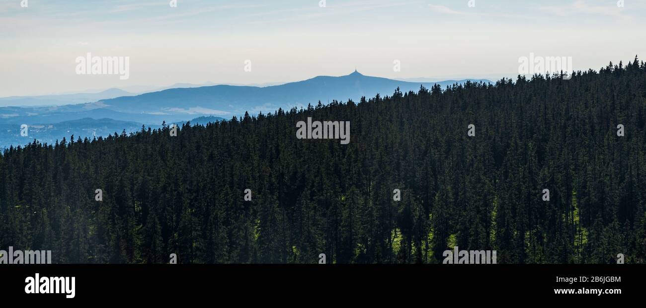 Jested hill from Vosecka bouda hut in Krkonose mountains in Czech republic during summer evening Stock Photo