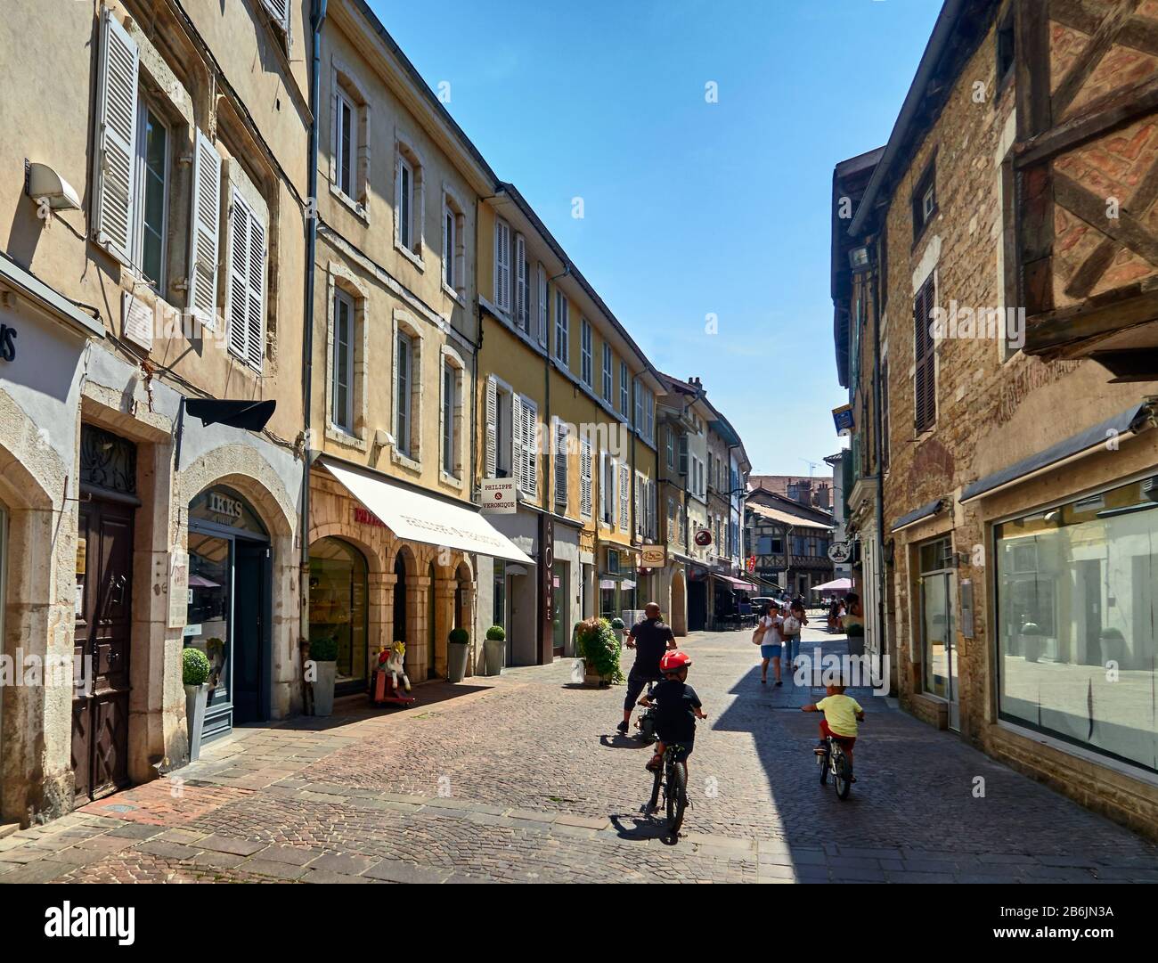 France, Ain departement, Auvergne - Rhone - Alpes région. In the old town of Bourg-en- Bresse, the shopping streets are pedestian, Cityscape,and have kept their traditional habitat Stock Photo