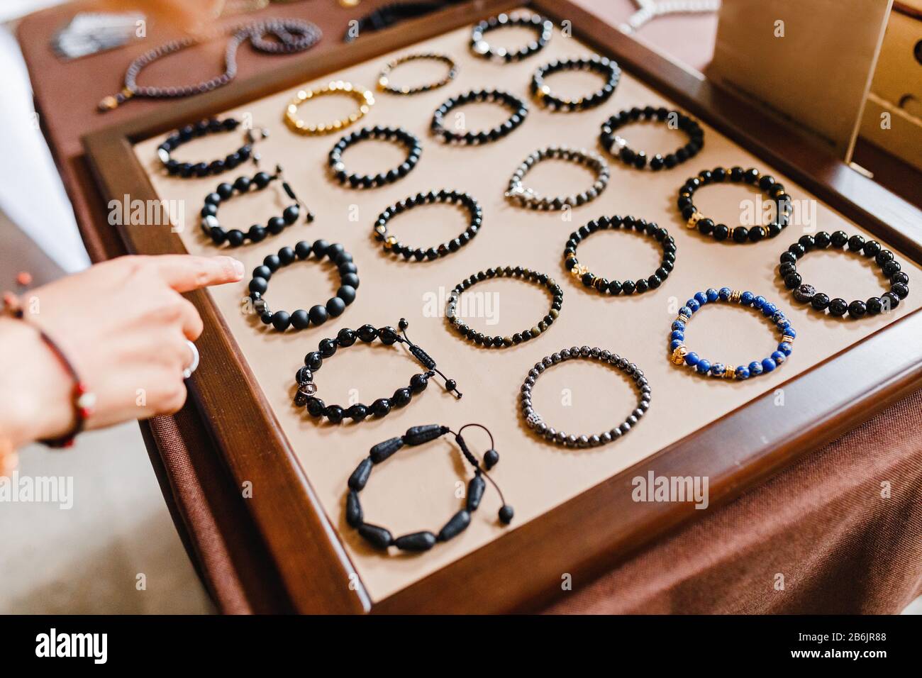 Handmade beads bracelets for sale at the jewelry shop Stock Photo Alamy