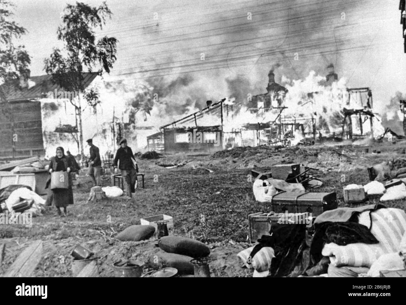 SCORCHED EARTH. Russians set fire to their village near Leningrad in 1941 to help foil a German advance. Stock Photo