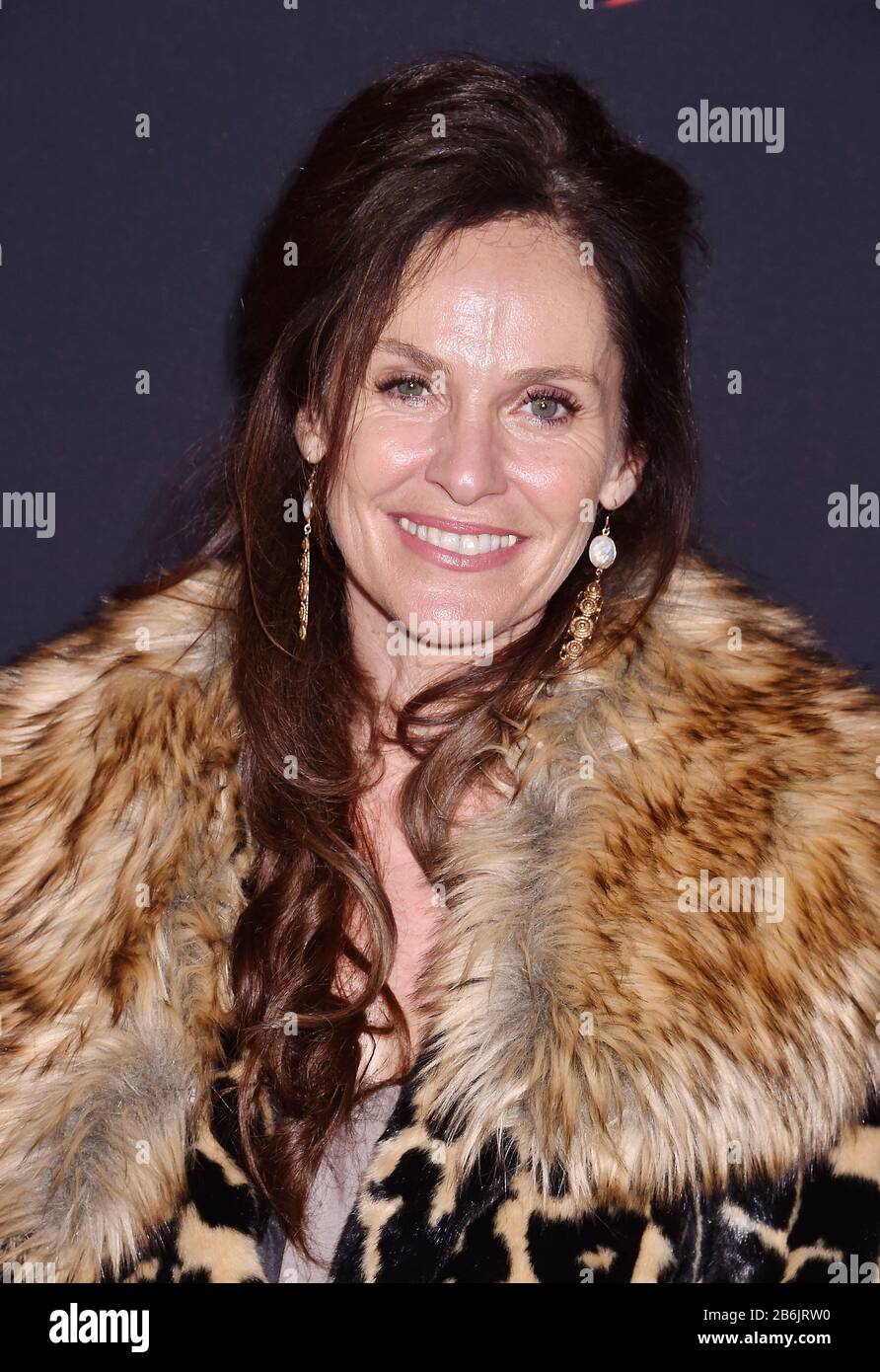 HOLLYWOOD, CA - MARCH 09: Amy Brenneman attends the premiere of Disney's 'Mulan' at the El Capitan Theatre on March 09, 2020 in Hollywood, California. Stock Photo