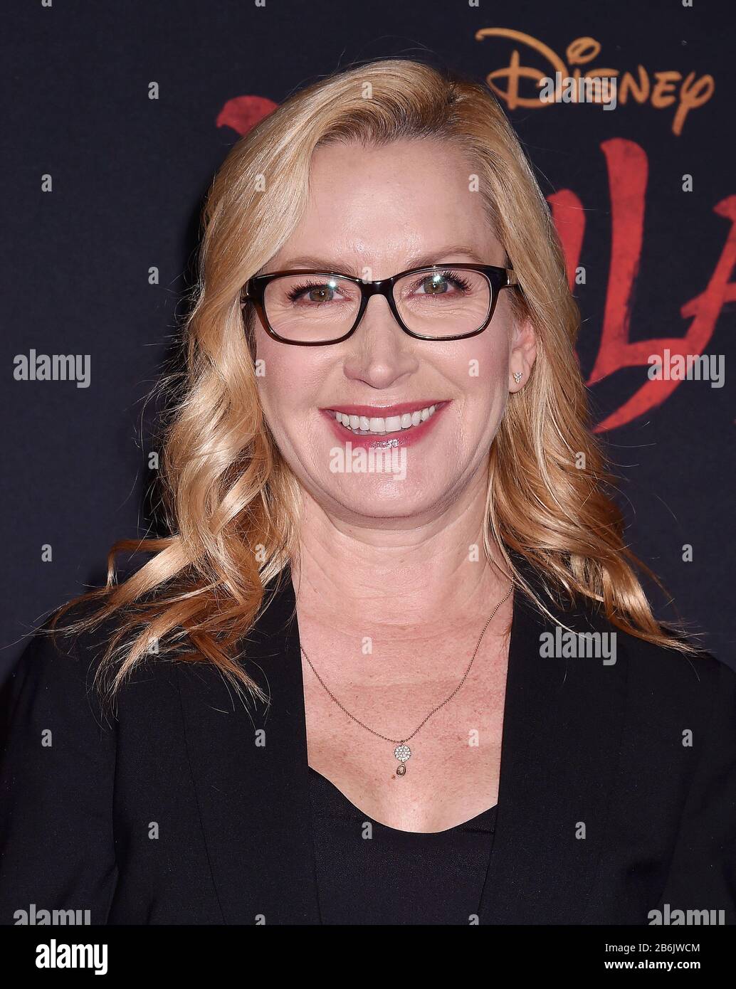 HOLLYWOOD, CA - MARCH 09: Angela Kinsey attends the premiere of Disney's 'Mulan' at the El Capitan Theatre on March 09, 2020 in Hollywood, California. Stock Photo