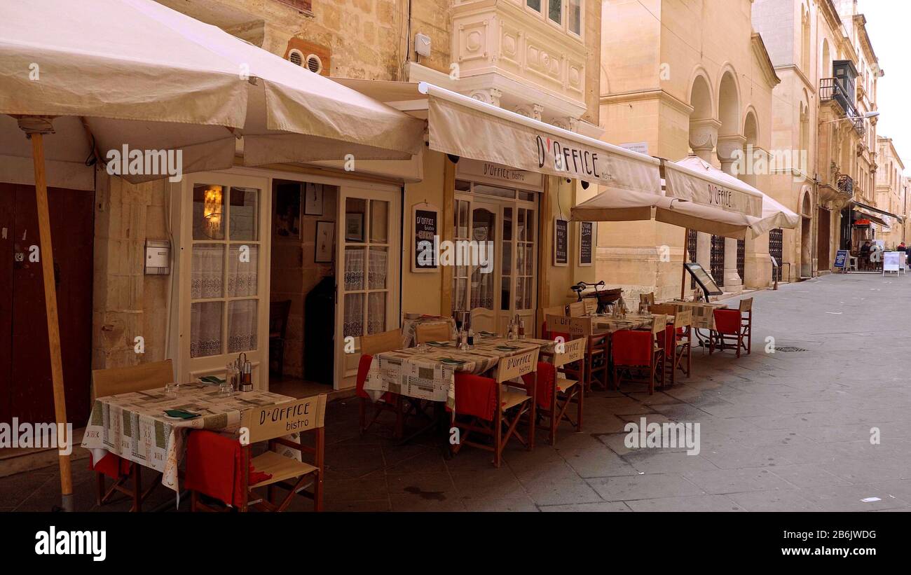 Bistro and restaurants in the historic district of Valletta - MALTA, MALTA  - MARCH 5, 2020 Stock Photo - Alamy, image size:1300x821