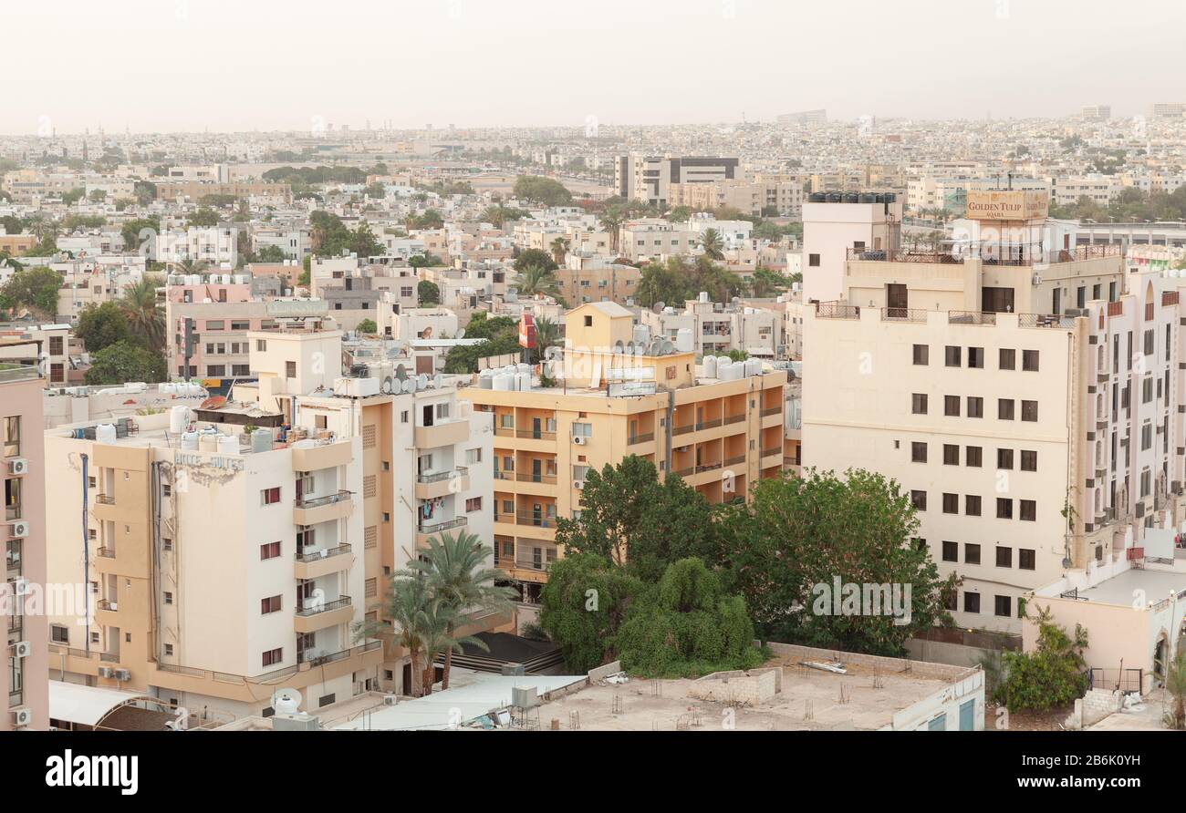 Aqaba, Jordan - May 18, 2018: Cityscape of Aqaba city with modern living houses, bird eye view Stock Photo