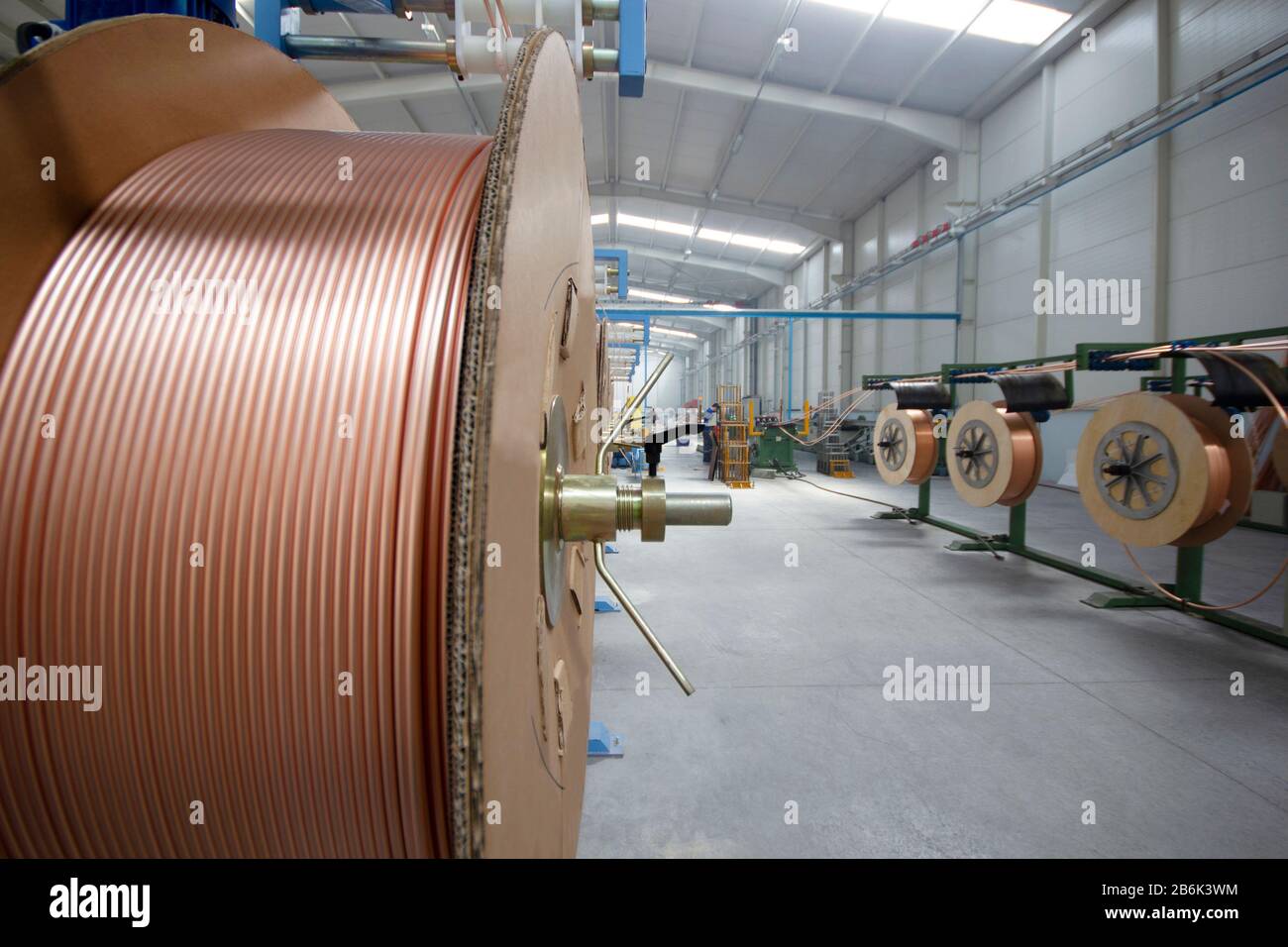 new copper pipes at the factory Stock Photo Alamy