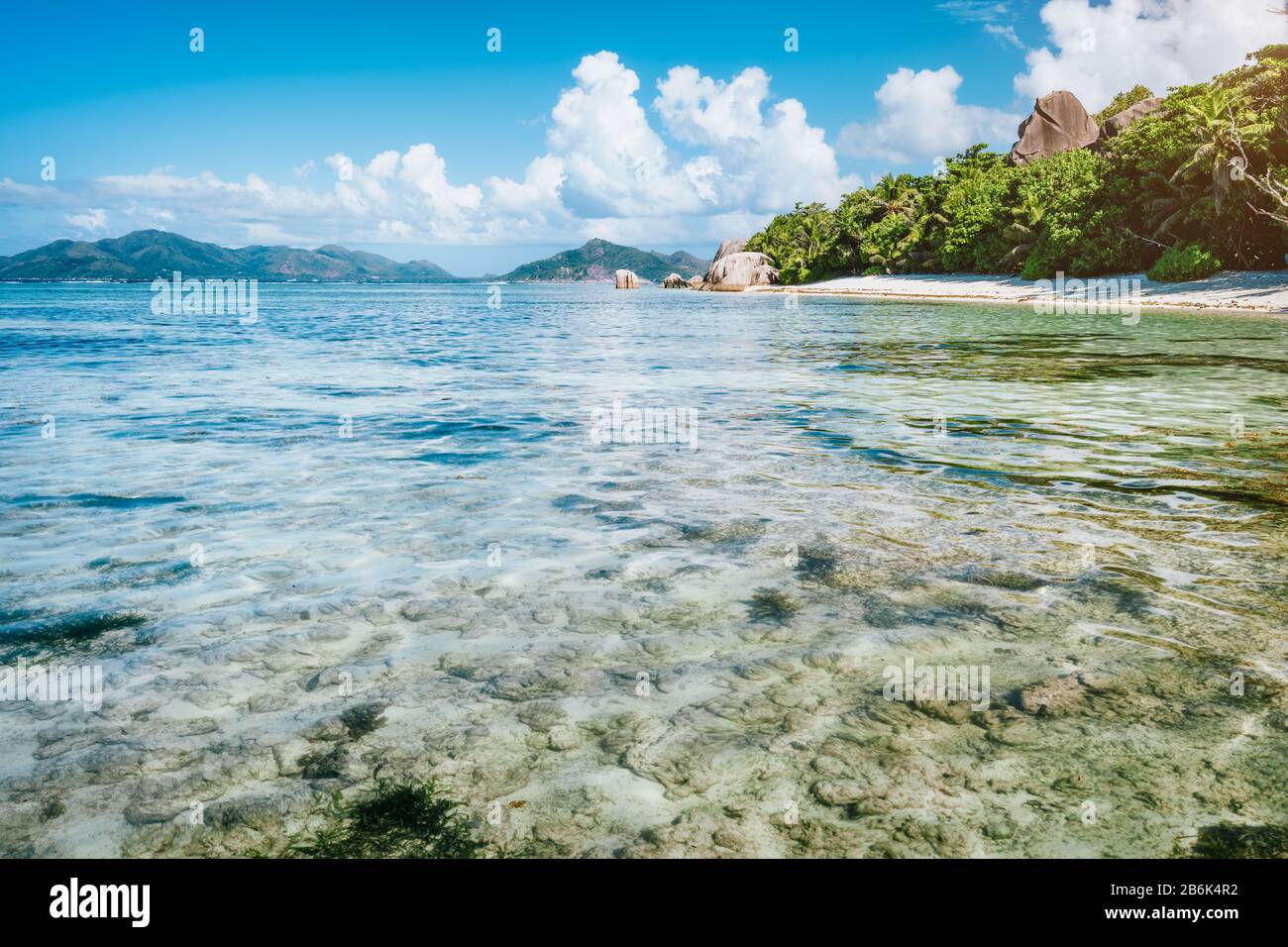 Vacation holiday on beautiful Anse Source D'Argent beach. Shallow lagoon, granite boulders, La Digue Island, Seychelles. Luxury paradise travel concep Stock Photo