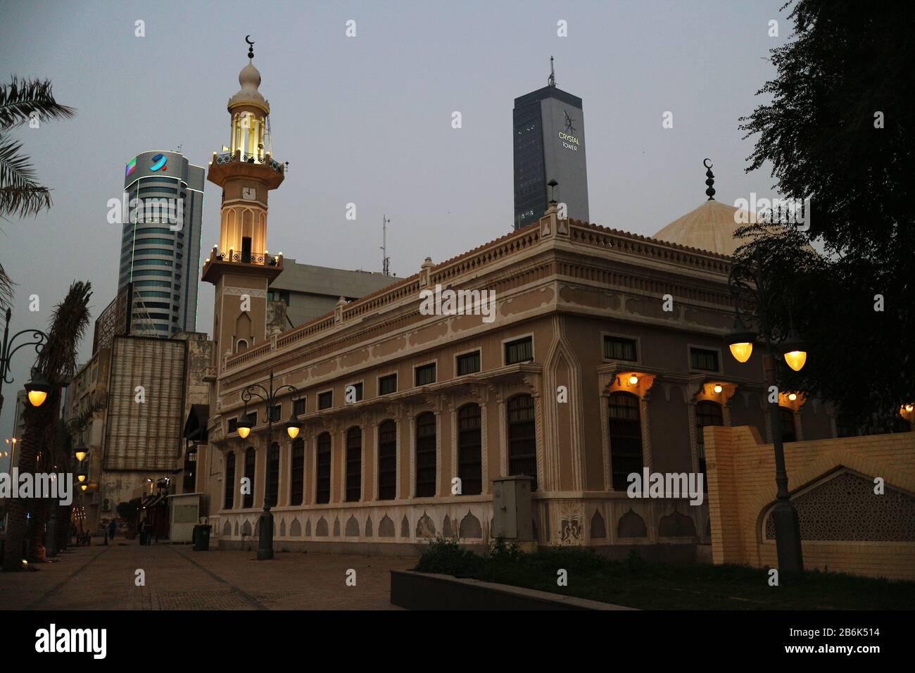 Curated visual reference: Fresh Look at Minaret Of Old Mosque Dwarfed By Modern High Rise Skyscrapers