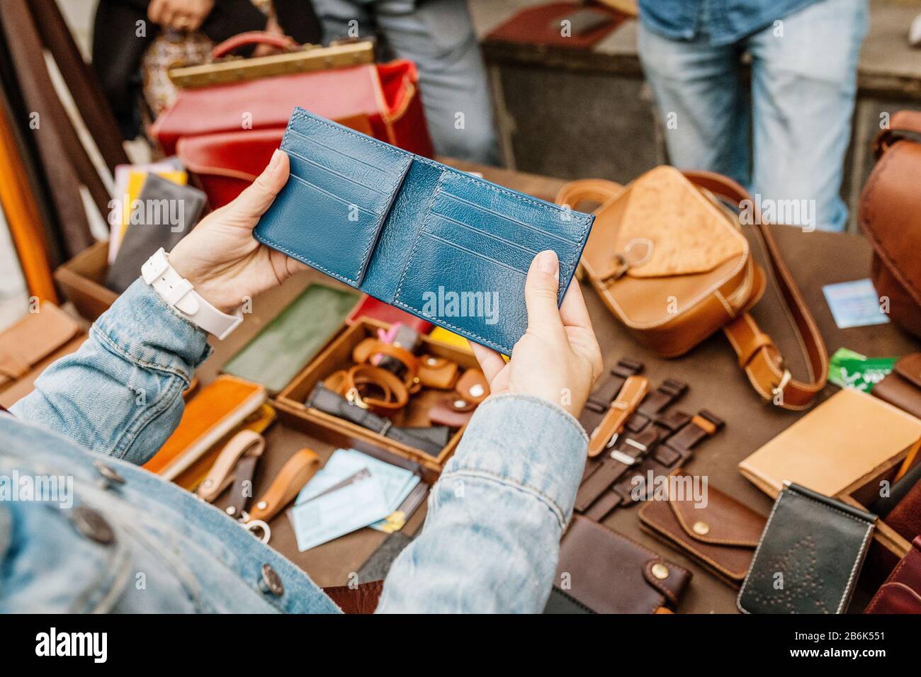 Handmade leather wallet. Fashion accessory concept Stock Photo - Alamy