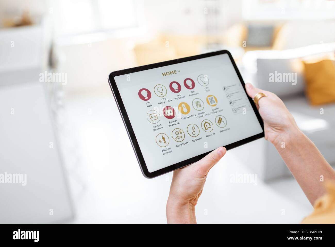Controlling smart home devices using a digital tablet with launched ...