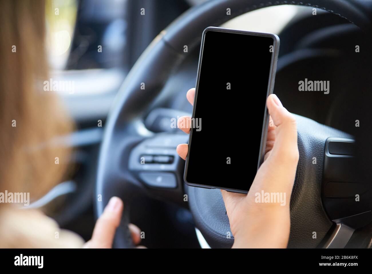 Phone mockup in car. Rent car driver Stock Photo - Alamy
