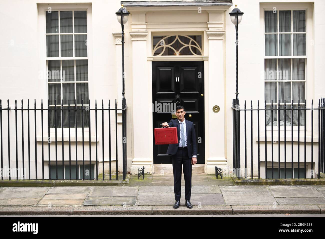 Chancellor Rishi Sunak outside 11 Downing Street, London, before heading to the House of Commons to deliver his Budget. Stock Photo