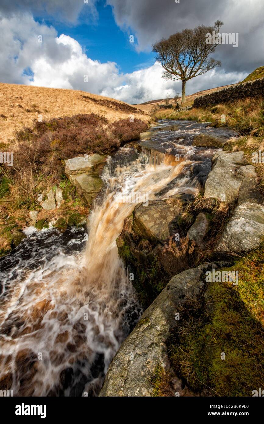 waterfall tumbling over rocks on moorland close to the west yorkshire pennine town of hebden bridge Stock Photo