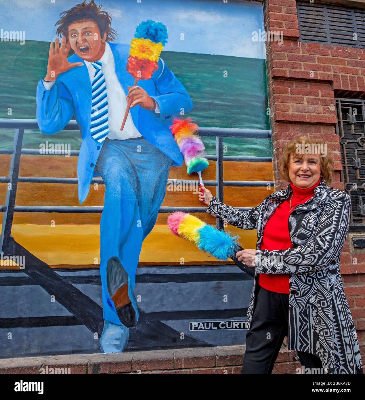 Lady Anne Dodd unveils the mural of Ken Dodd at the Liverpool Royal Court Theatre, Liverpool. PA Photo. Picture date: Wednesday March 11, 2020. The mural was commissioned by The Comedy Trust and was created by the artist Paul Curtis. Photo credit should read: Peter Byrne/PA Wire Stock Photo