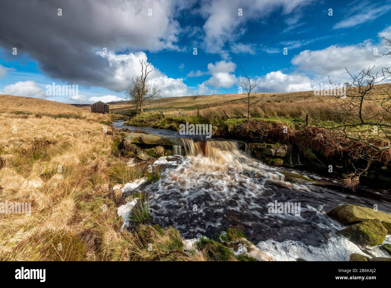 waterfall tumbling over rocks on moorland close to the west yorkshire pennine town of hebden bridge Stock Photo