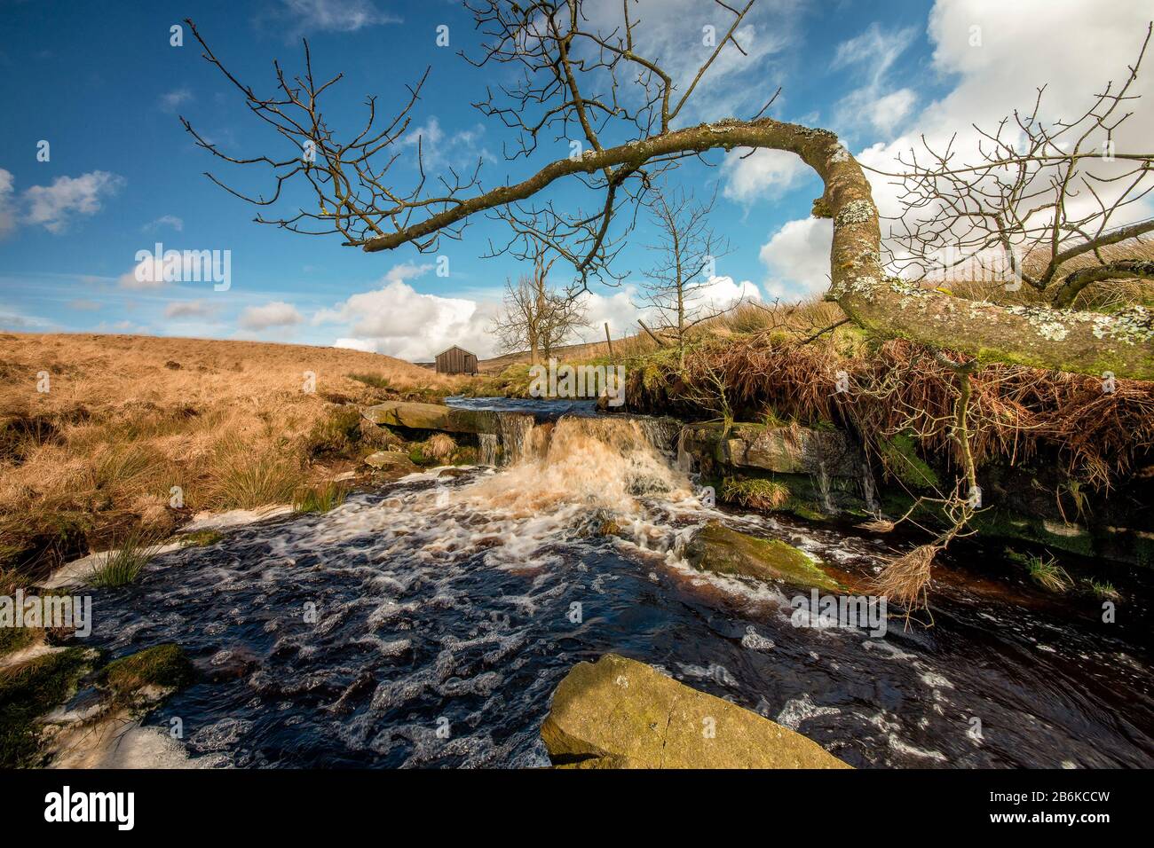 waterfall tumbling over rocks on moorland close to the west yorkshire pennine town of hebden bridge Stock Photo