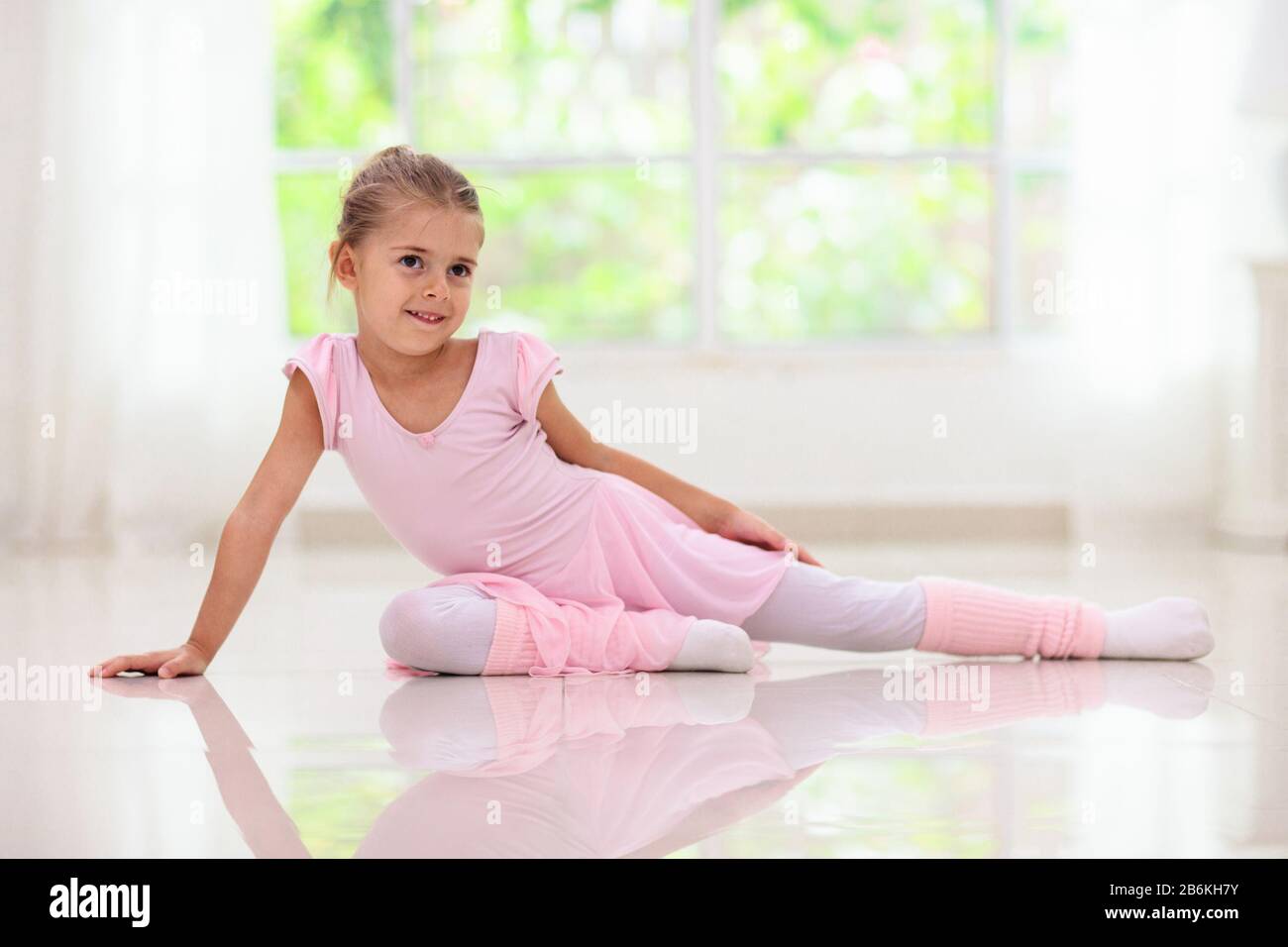 Baby ballet studio. Little ballerina in dance class. Cute girl in pink tutu and leotard learning to dance. Classic choreography for kids. Child dancer Stock Photo Alamy