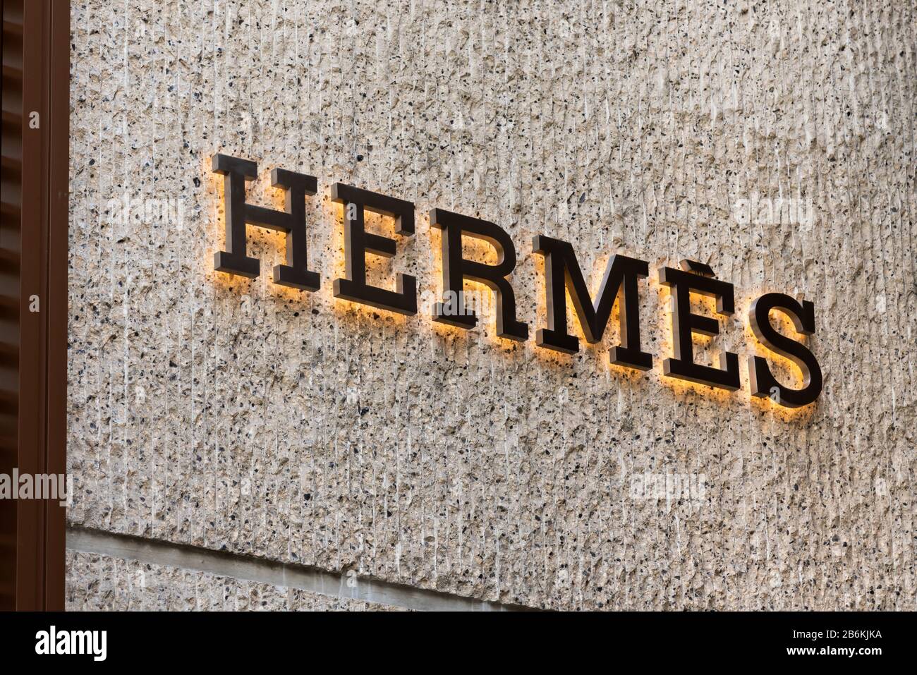 A view of a French high fashion luxury goods manufacturer Hermes logo Stock  Photo - Alamy