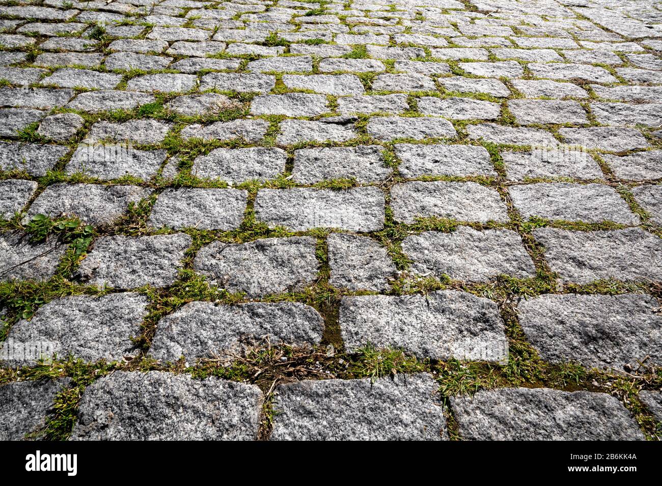 Gray cobble stone walkway or square. Pavement texture Stock Photo