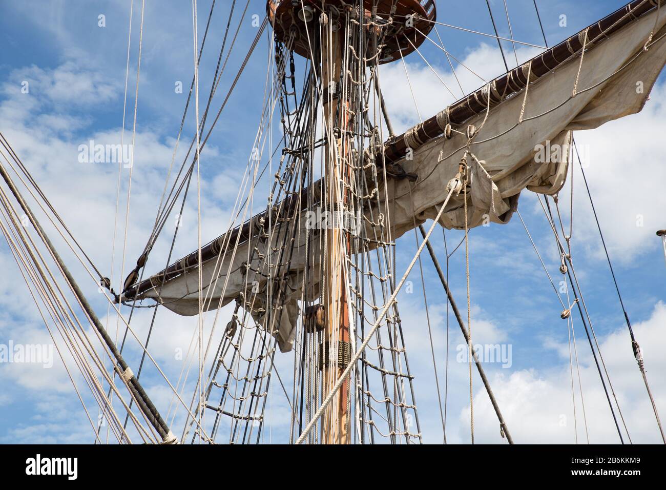 Wooden Mast Rig and Sail of Old Sailing Ship Stock Photo