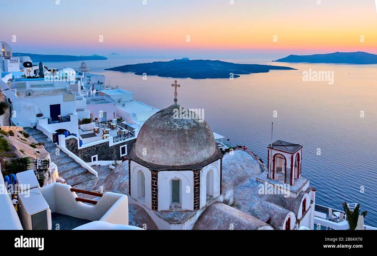 Thira town in Santorini island and the sea at sunset, Greece -  Greek landscape - cityscape Stock Photo