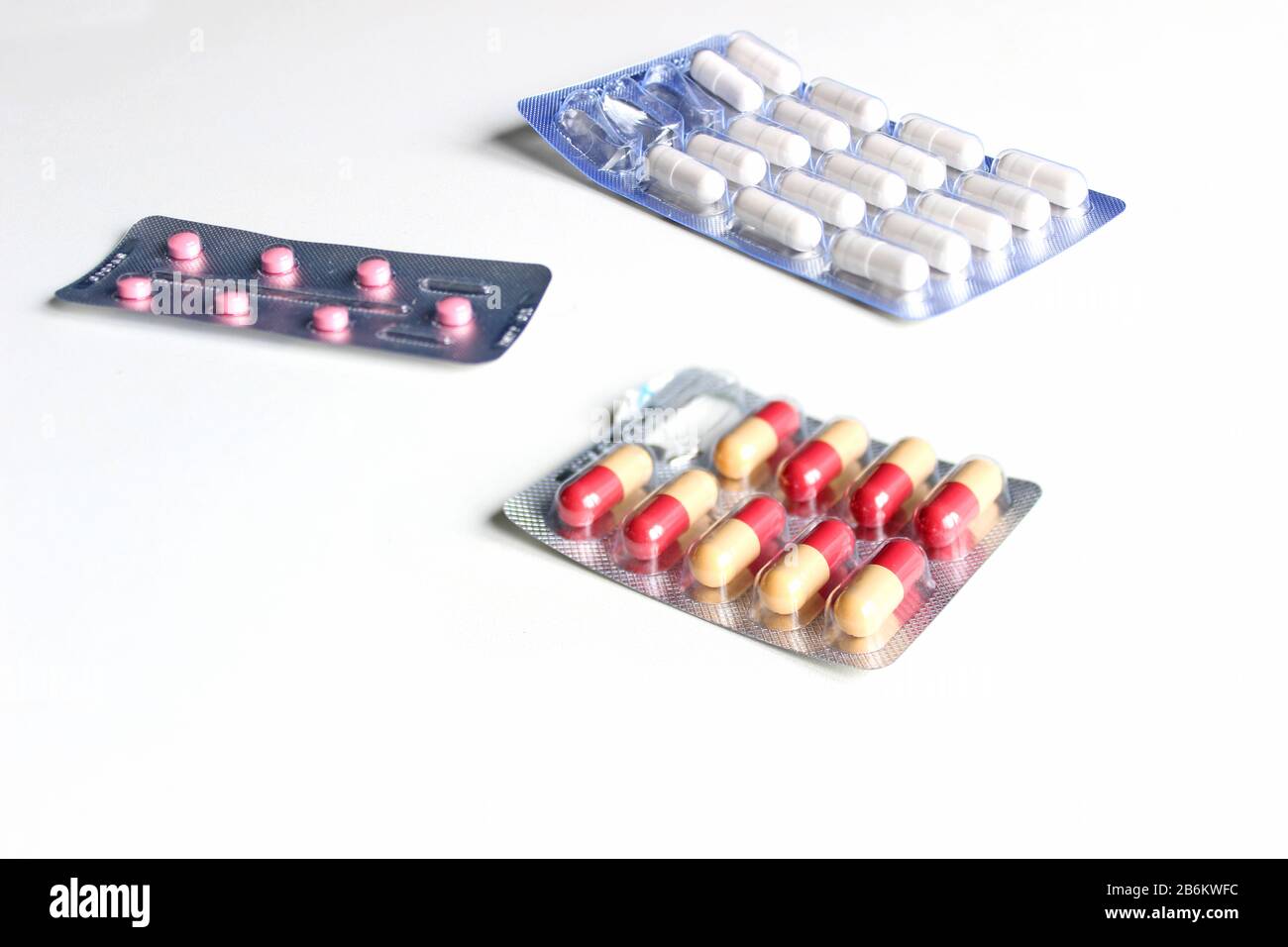 pharmaceuticals antibiotics pills medicine /colorful antibacterials pills on white background /capsule pill medicine. blister Stock Photo