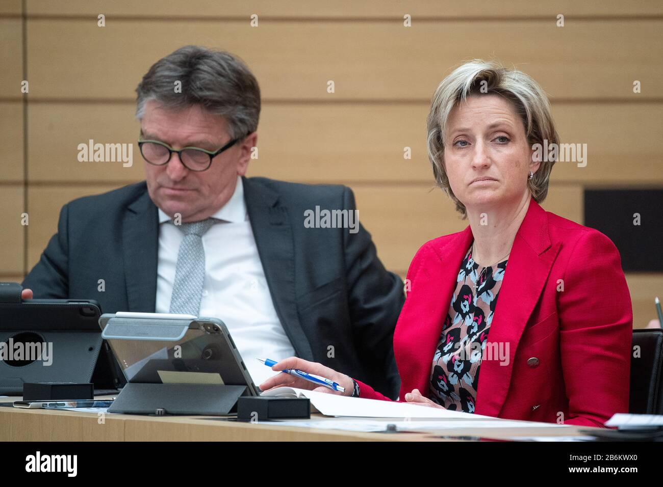 11 March 2020, Baden-Wuerttemberg, Stuttgart: Manfred Lucha (Bündnis 90/Die Grünen), Minister of Health of Baden-Württemberg, and Nicole Hoffmeister-Kraut (CDU), Minister of Economics, Labour and Housing of Baden-Württemberg, will participate in the 113th plenary session of the 16th State Parliament of Baden-Württemberg. Topics included the effects of coronavirus on the economy of the state. Photo: Sebastian Gollnow/dpa Stock Photo