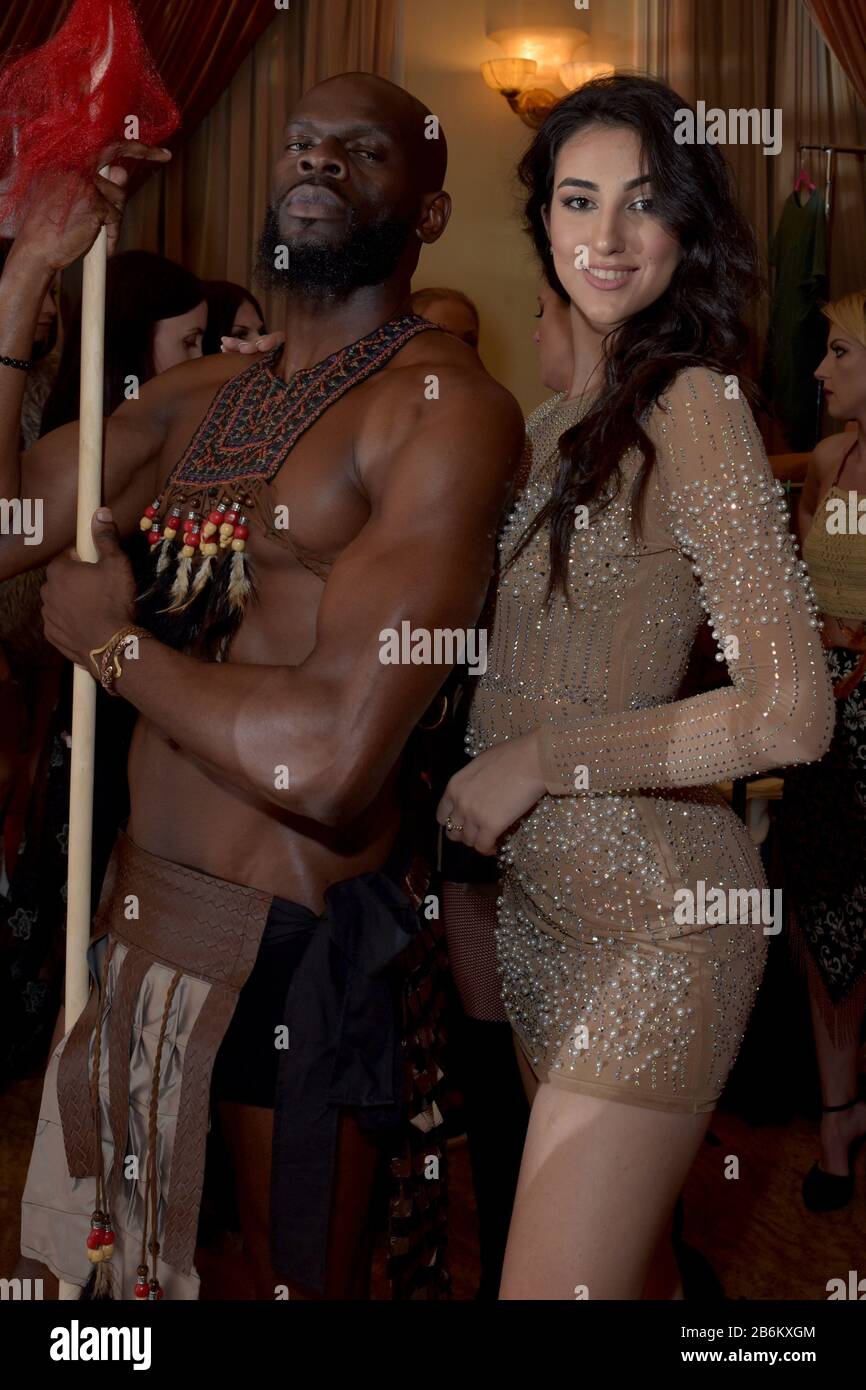 mMODEL WEARING SOLID PURPLE DRESS Stock Photo