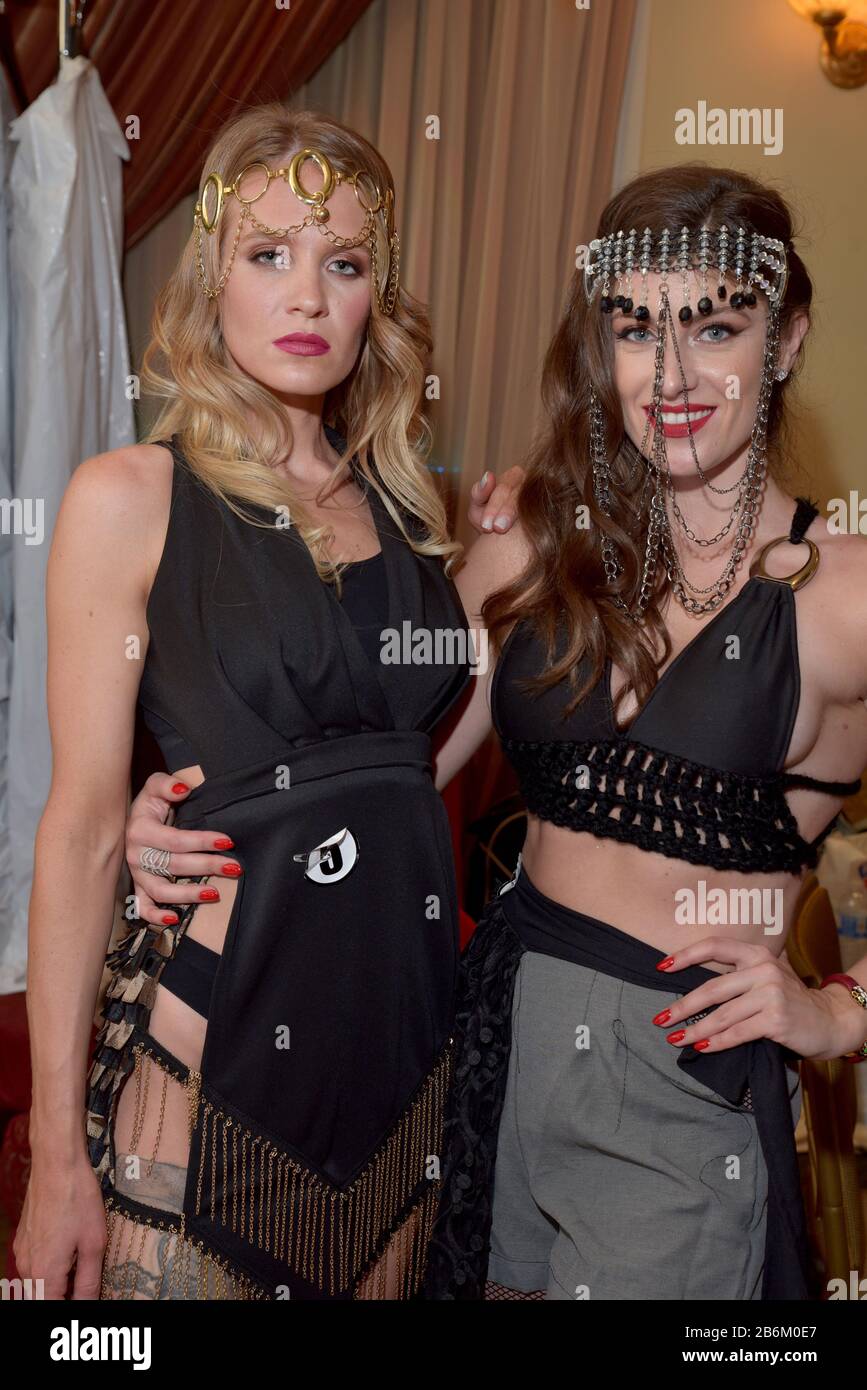 mMODEL WEARING SOLID PURPLE DRESS Stock Photo