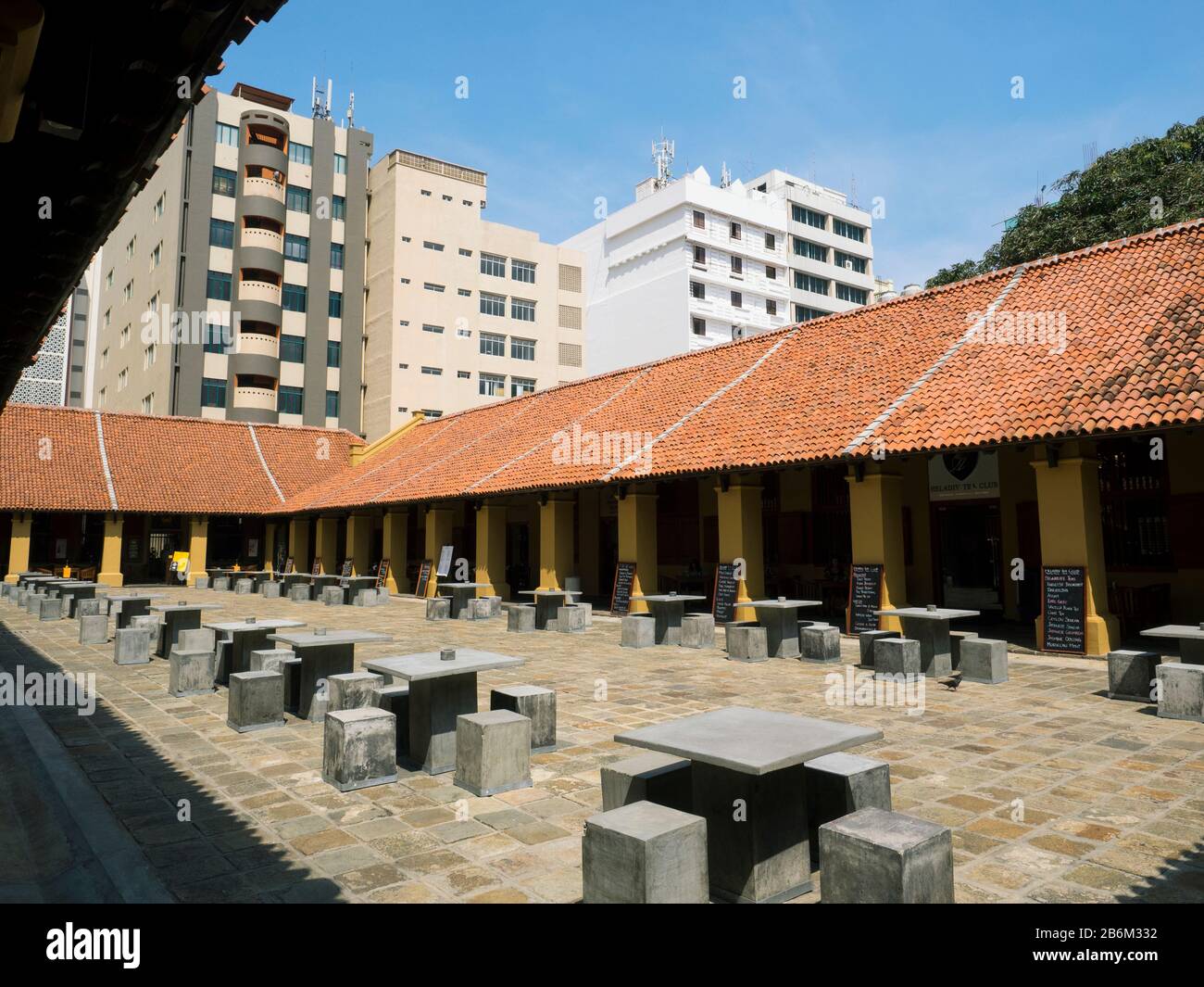 View of outdoor seating at restored 17th c. Old Dutch Hospital, fort area Colombo, Central Province, Sri Lanka Stock Photo