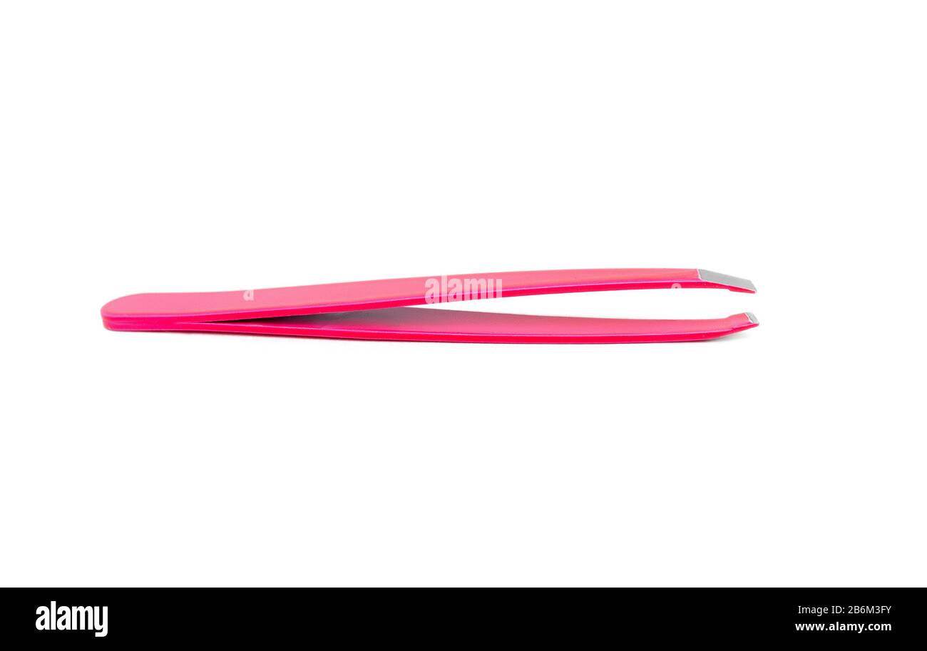 pink woman's cosmetic tweezers for plucking eyebrows isolated Stock