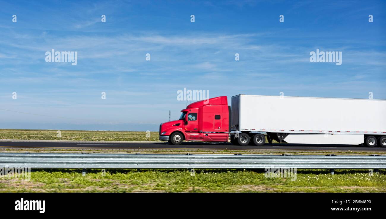 Semi truck moving on the highway, US Interstate 5, California, USA Stock Photo