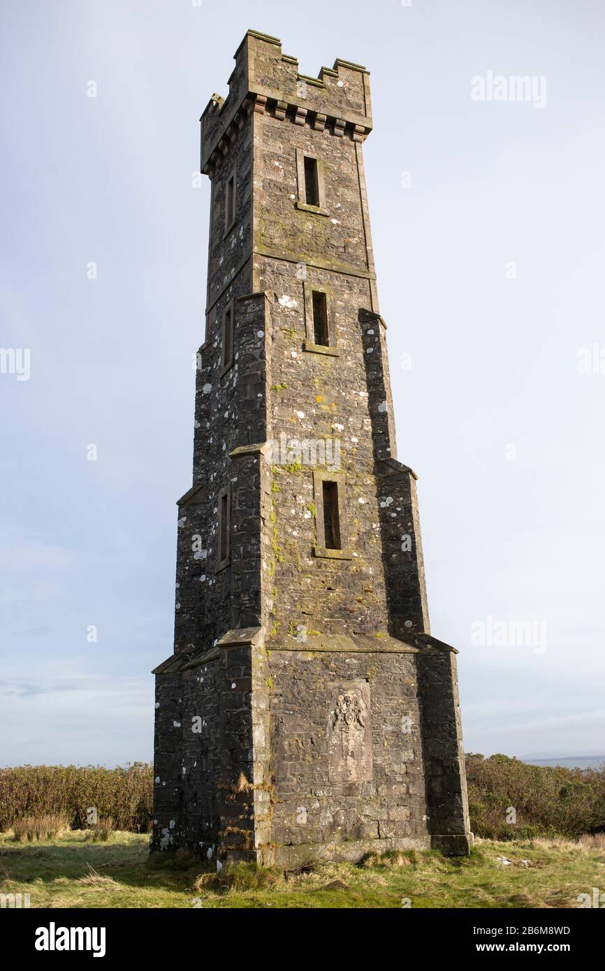 A castellated tower on top of Tor of Craigoch (Iron Age Hill Fort) dedicated to the memory of Sir Andrew Agnew (1793-1849), 7th Baronet of Lochnaw nea Stock Photo