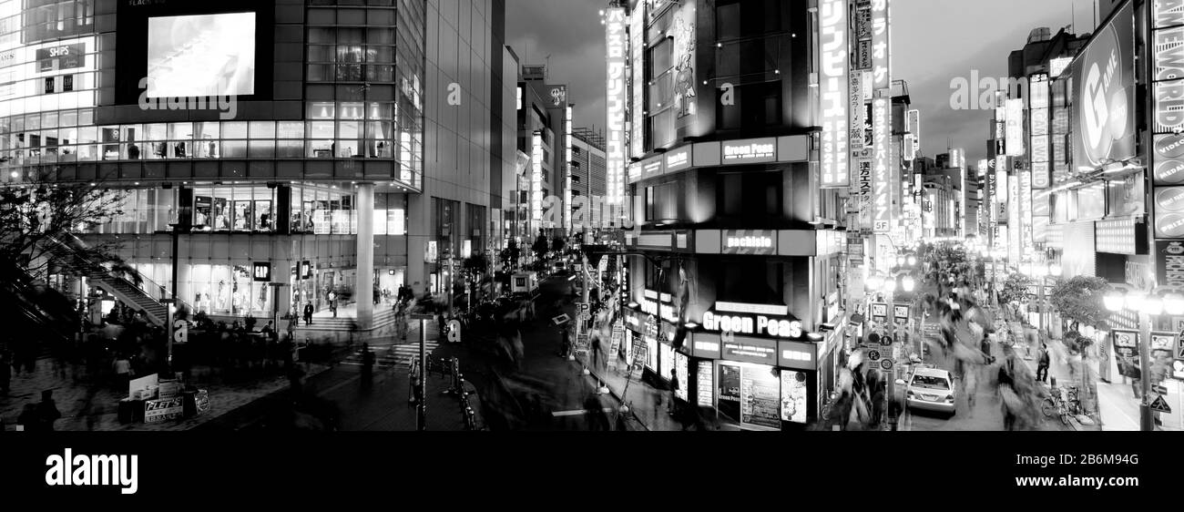 Buildings lit up at night, Shinjuku Ward, Tokyo Prefecture, Kanto Region, Japan Stock Photo