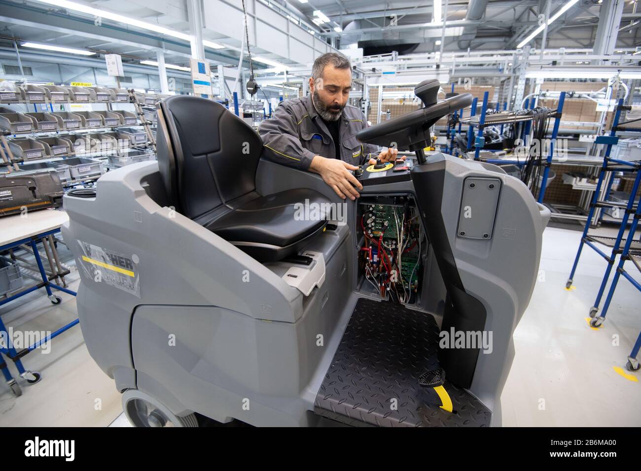 Winnenden, Germany. 09th Mar, 2020. An employee of Alfred Kärcher SE & Co.  KG assembles a scrubbing machine. (to dpa "Kärcher CEO Jenner on the 2019  balance sheet and the prospects for