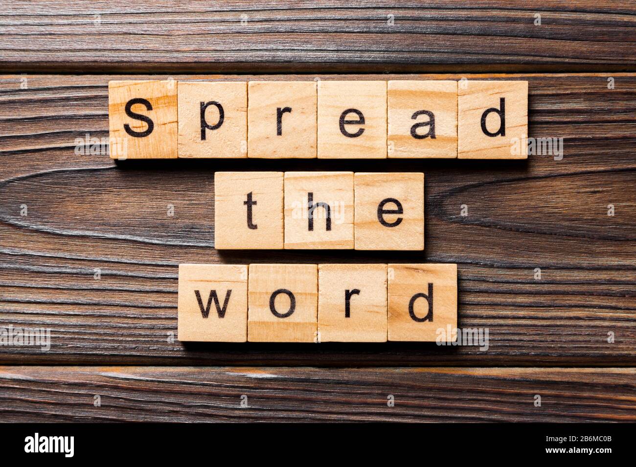 Spread the word word written on wood block. Spread the word text on table, concept Stock Photo