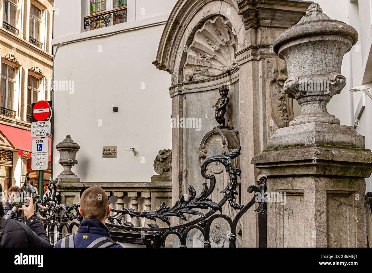 The famous sculpture Manneken Pis, in Brussels, Belgium. March 2019. Stock Photo