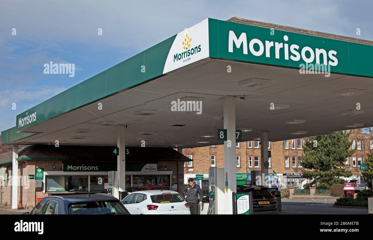 Edinburgh, Scotland, UK. 11th Mar 2020.  In today's Budget fuel duty has been frozen for the 11th year running, meaning that the duty - applied on top of VAT - will remain at 57.95p per litre for petrol and diesel. Pictured, Scots drivers filling up with supermarket petrol and diesel at Morrisons while they benefit from the reduction in fuel prices in the UK. Stock Photo