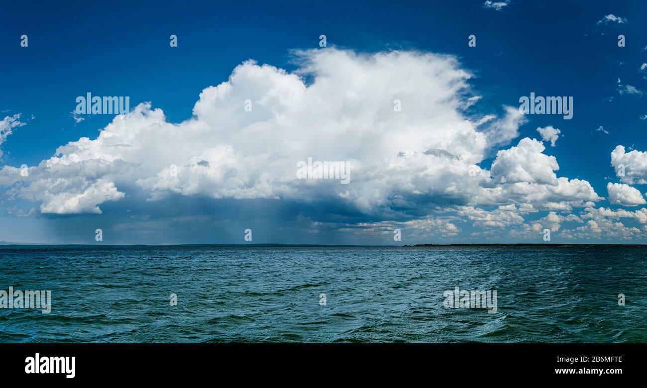 View of clouds above lake, Candle Lake, Saskatchewan, Canada Stock Photo