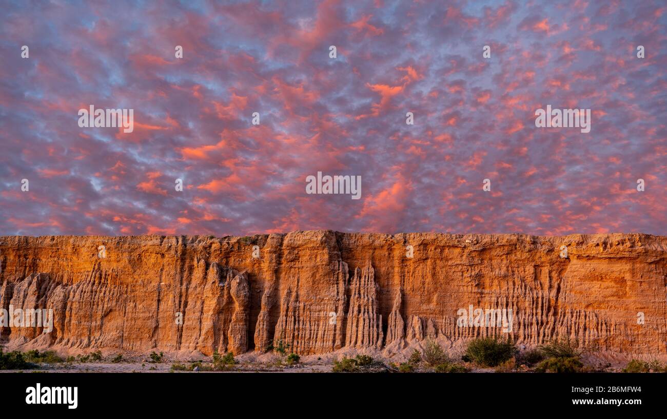 View of cloudscape over rock formation, Baja California Sur, Mexico Stock Photo